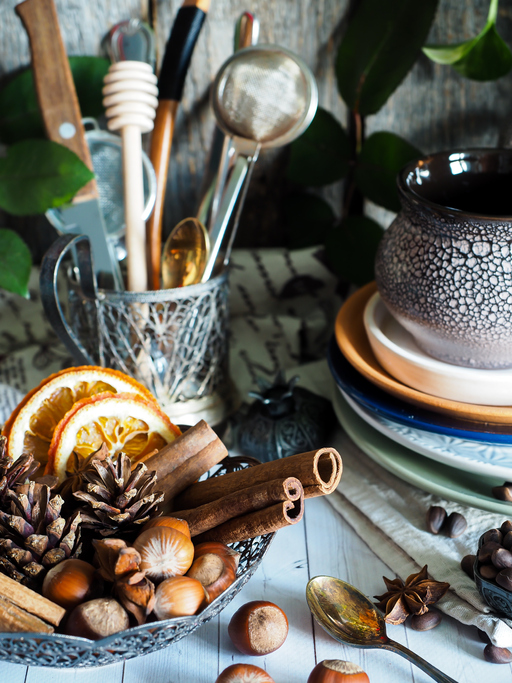 Winter ingredients in a bowl, empty cookware. Rustic style,