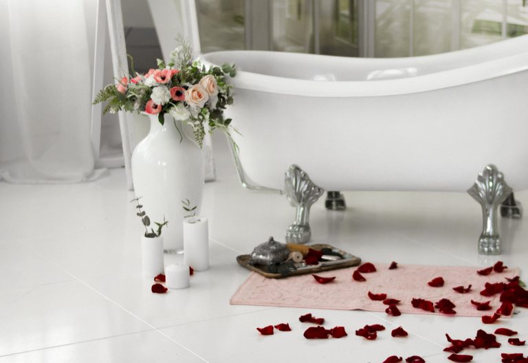 Spa Relax In Flower Bath. Spa Salon. Bath with rose petals. Relaxation with rose petals
