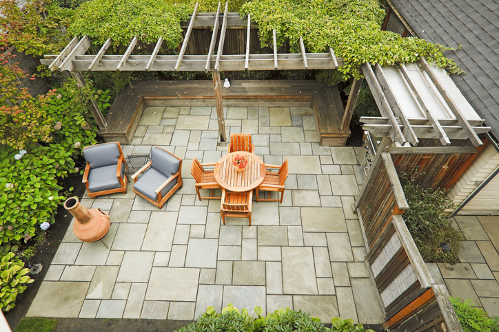Looking down on a cozy outdoor living patio.