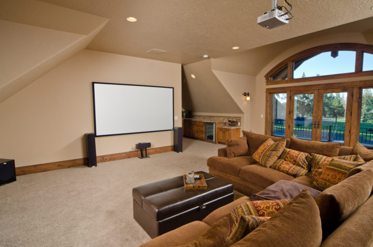 This is a modern home theater room.